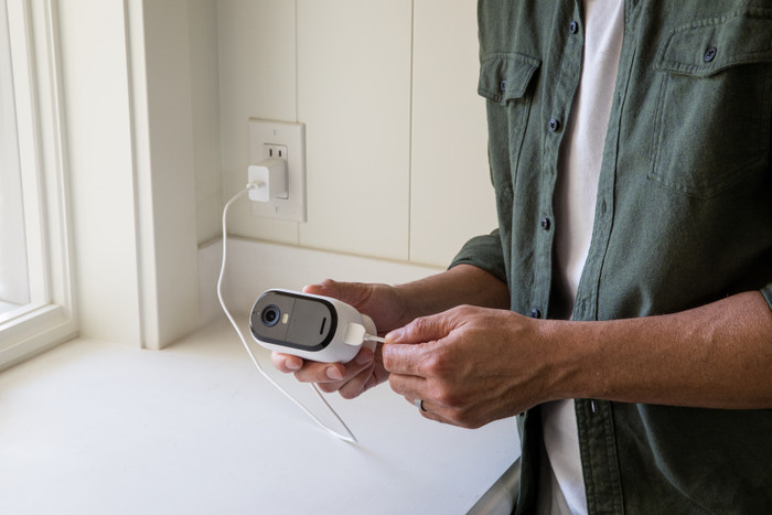 Arlo Essential 2K Outdoor Security Camera 3-pack product in use