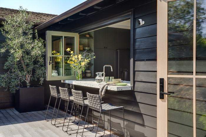 Arlo Essential 2K Outdoor Security Camera 3-pack product in use