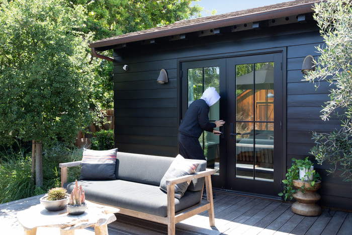 Arlo Essential 2K Outdoor Security Camera 3-pack product in use