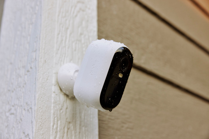 Arlo Essential 2K Outdoor Security Camera 3-pack product in use