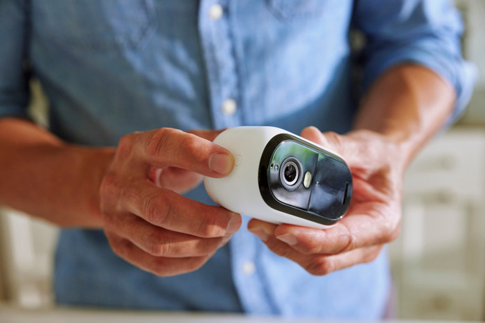 Arlo Essential 2K Outdoor Security Camera 3-pack product in use