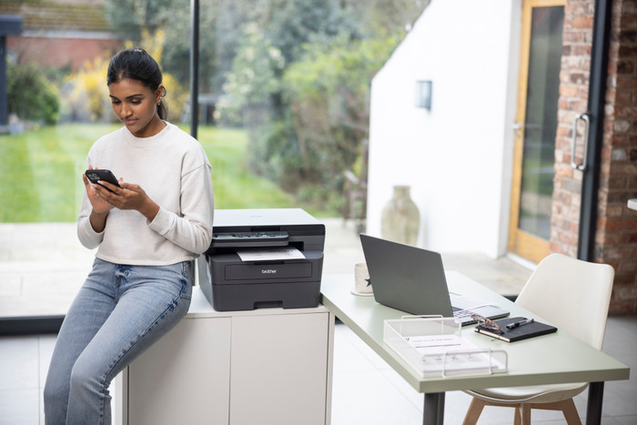 Brother DCP-L2627DWE product in use