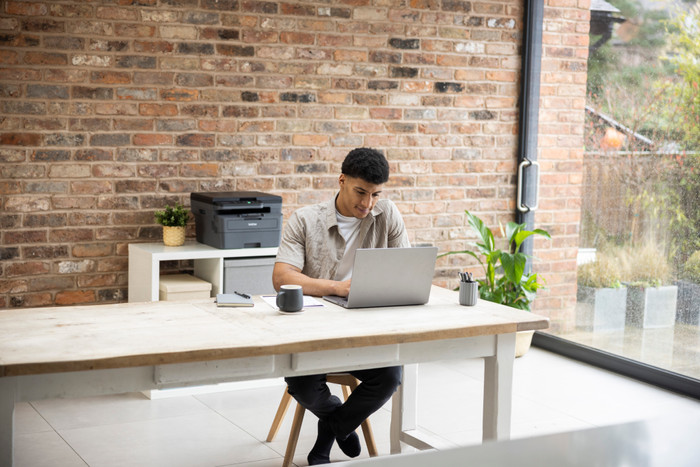 Brother DCP-L2627DWE product in use