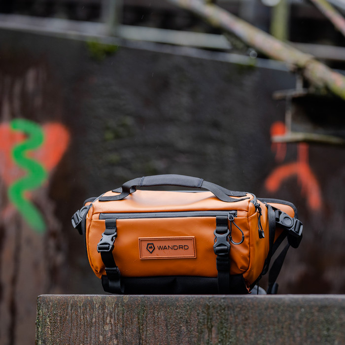 WANDRD Rogue Sling 6L Orange product in use