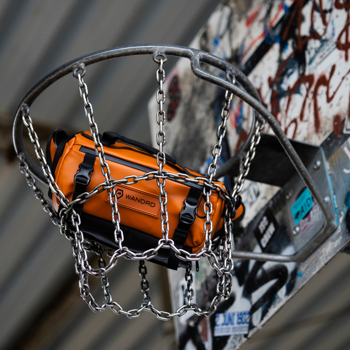 WANDRD Rogue Sling 6L Orange product in use