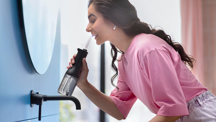 Philips Sonicare DiamondClean 9000 HX3886/43 + Power Flosser Black product in use