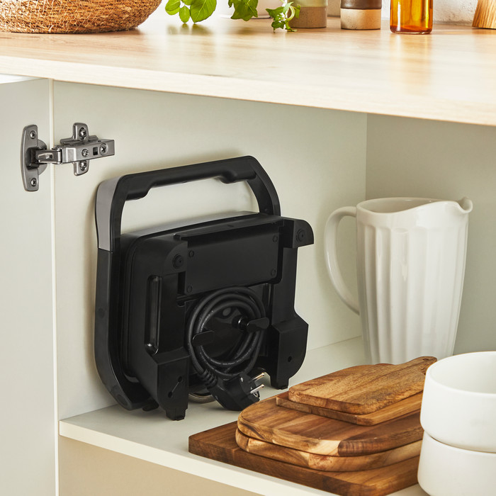 Tefal Inicio Compact GC270D product in use