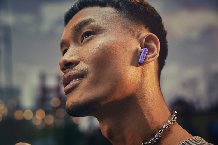 JBL Tune Beam 2 Ghost Purple product in use