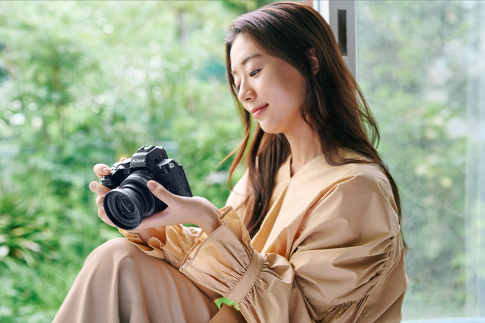 Nikon Z50 II + DX 16-50mm f/3.5-6.3 + Backpack product in use