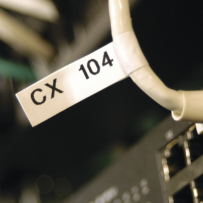 DYMO Rhino 12mm x 5.5m Black White Vinyl Labels product in use