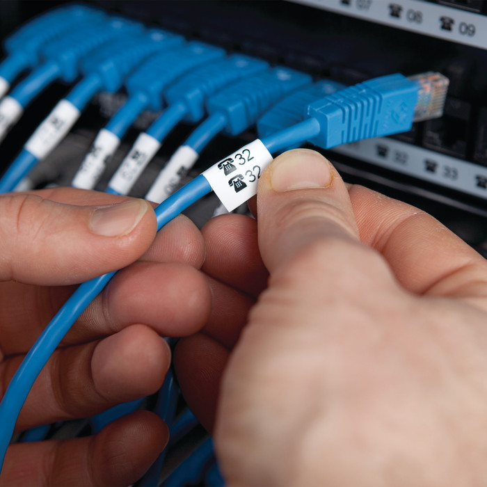 DYMO Rhino 19mm x 5.5m Black White Vinyl Labels product in use