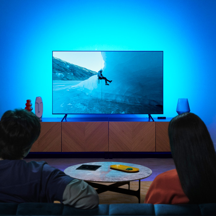 WiZ HDMI Sync Box + Light Strip for 75 - 85-inch TVs product in use