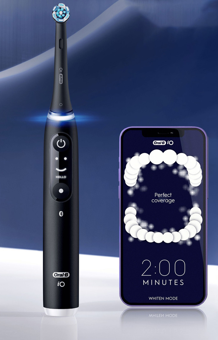 Oral-B iO 6N Black + Extra iO Gentle Care Brush Attachment product in use