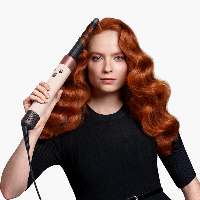 Dyson Airwrap i.d. Straight + Wavy Ceramic Pink product in use