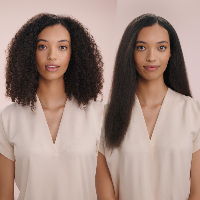 Dyson Airstrait Limited Edition Amber Silk product in use