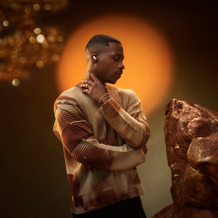 Bose QuietComfort Ultra Earbuds (2nd Gen) Gold product in use