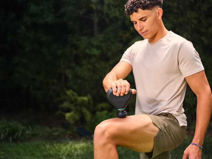 Therabody Theragun Mini Plus Black product in use