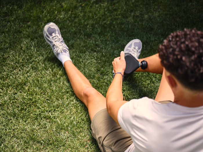 Therabody Theragun Mini Plus Black product in use