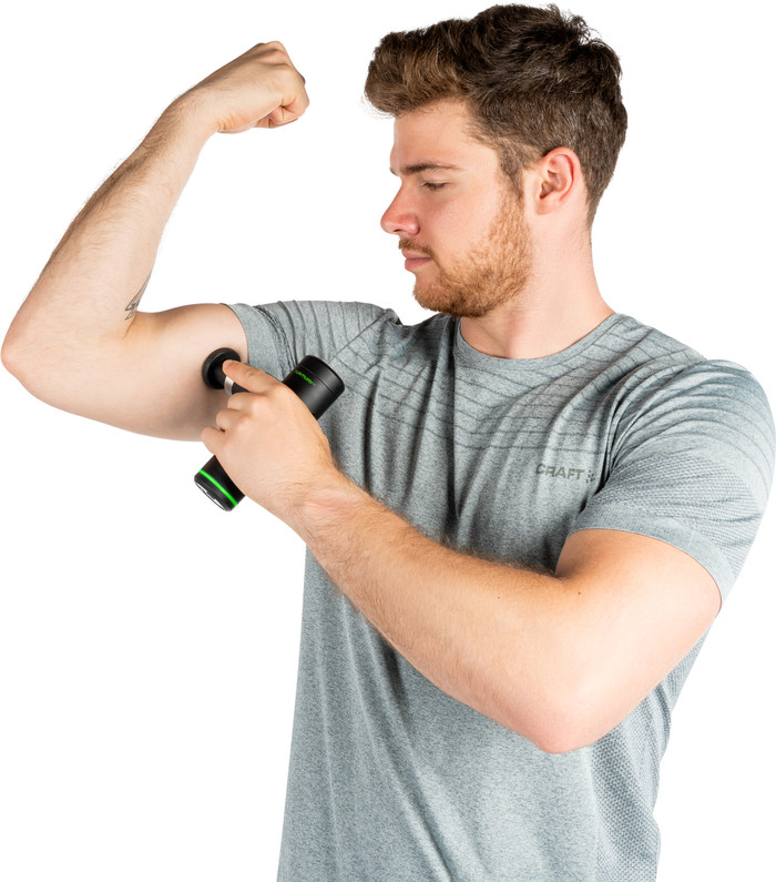 Tunturi Massage Gun Mini + Massage Head Warm and Cool product in use