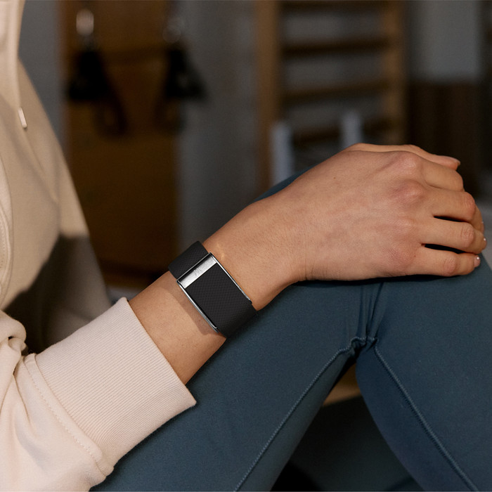 WHOOP MG Life Schwarz produkt in gebrauch