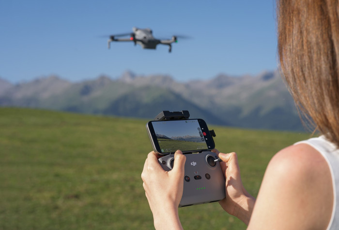 DJI Mini 5 Pro Fly More Combo + Remote Controller product in use