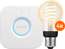 Philips Hue Filament White Ambiance Standard Viererpack + Bridge Philips Hue Filament Starterpaket