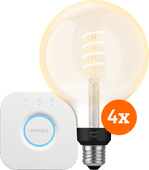 Philips Hue Filament White Ambiance Globe XL Viererpack + Bridge Philips Hue Filament Starterpaket